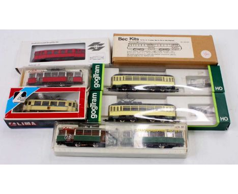 A collection of H0 scale trams to include a Liliput 25 Years Strassebahnen tram &amp; coach gift sets, an unmade Bec Kits Pre