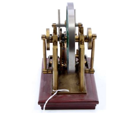 A well-engineered station steam engine, comprising of single vertical cylinder engine fitted with slip eccentric, with centra