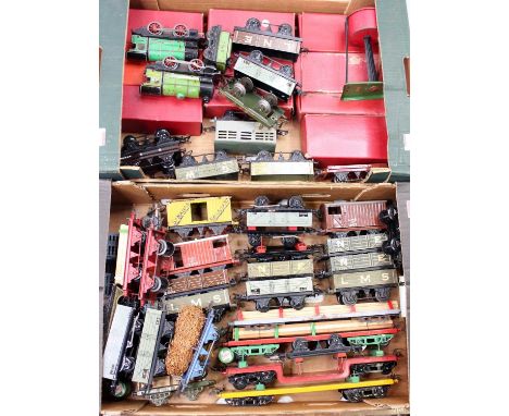 Approx 45 Hornby 0 gauge goods wagons, a wide variety from 1940’s onwards, a few boxed, a few without wheels. Overall (G). wi