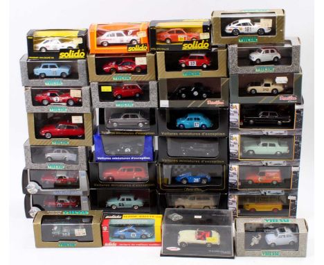 Two trays containing a quantity of 1/43rd scale diecast, with specific examples including a Universal Hobbies MGB Monte Carlo