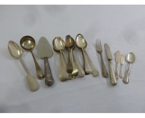 A quantity of hallmarked silver flatware to include a sauce ladle, and a cake slice (21)