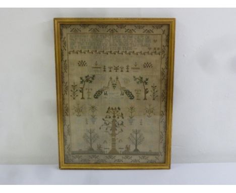 An 18th century framed and glazed sampler depicting figures, animals and birds, 44 x 32.5cm