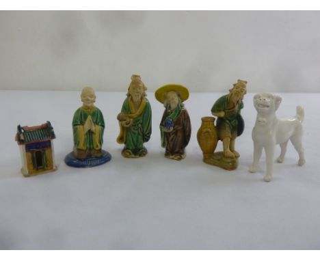 Six Chinese ceramic figurines of figures and a dog