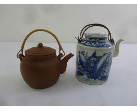A 19th century Chinese blue and white teapot and an Oriental unglazed ceramic teapot