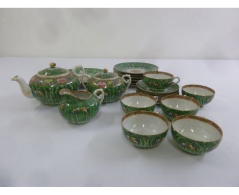 A Chinese eggshell green butterfly pattern teaset to include teapot, sugar bowl and cream jug (23)