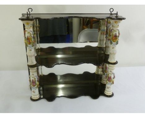 A Victorian three shelf wall unit with polychromatic ceramic columns