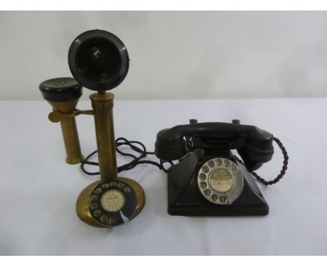 A Vintage stick telephone and early Bakelite phone