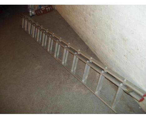 A DOUBLE ALUMINIUM LADDER 6 METER WHEN EXTENDED