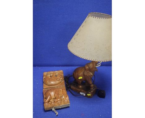 A TABLE LAMP IN THE FORM OF AN ELEPHANT TOGETHER WITH AN ELEPHANT BOOK STAND A/F