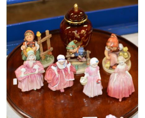 WOODEN LAZY SUSAN, 3 HUMMEL FIGURINES, 4 ROYAL DOULTON FIGURINES &amp; CARLTON WARE LIDDED JAR     