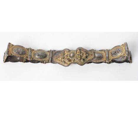 An Eastern silver belt with silver gilt filigree buckle and niello enamel roundels decorated buildings and foliate motifs