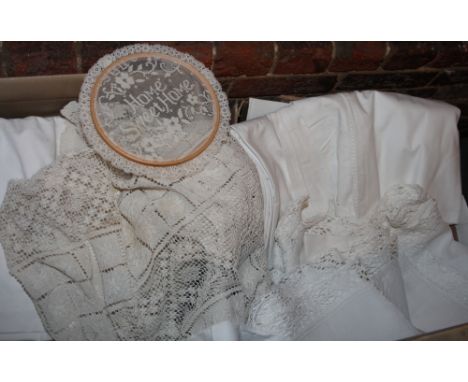 A collection of assorted vintage table linen and bedspreads, in two boxes