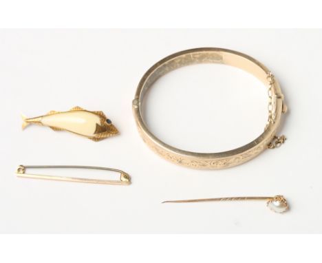 A 9ct gold hinged bangle, a 9ct gold bar brooch, a yellow metal and pearl mounted stick pin and a yellow metal mounted tooth 