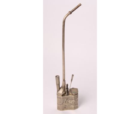 A Chinese white metal pipe with engraved decoration and accessories