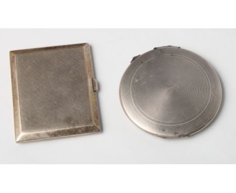 A silver cigarette case with engine turned decoration and a similar powder compact, 6.5oz troy approx