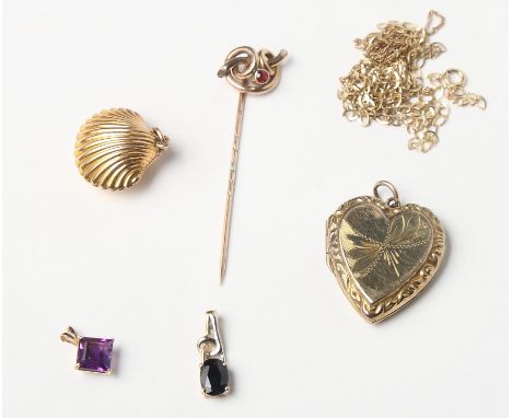 An Edwardian 9ct gold locket in the form of a clam shell with woven hair panel, a 9ct gold and ruby stick pin, two 9ct fine g