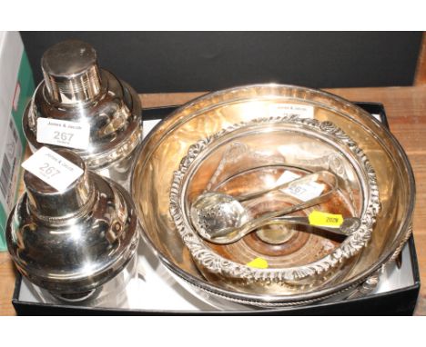 A silver plated cocktail shaker with engine turned banding, another plain example, a plated pedestal bowl, a plated caster, a