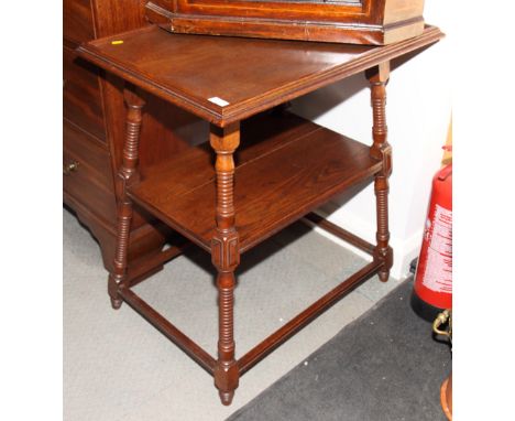 An oak rectangular two-tier occasional table, on ring turned supports