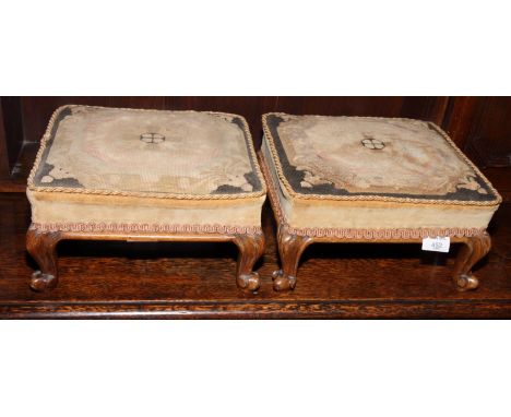 A pair of Victorian rectangular footstools, upholstered in petit point tapestry