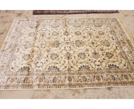A Kashmir carpet decorated Ziegler pattern on an ivory ground, 8' x 5' approx