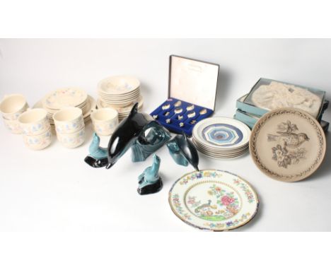 A Poole Pottery "Springtime" teaset, four Poole Pottery models of dolphins and seals and a small collection of decorative Poo
