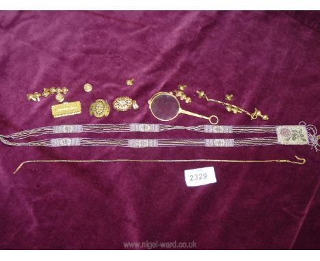 A fine beaded necklace, yellow metal Lorgnette, Pinchbeck bracelet fastenings, a pair of mourning studs with braided locks of
