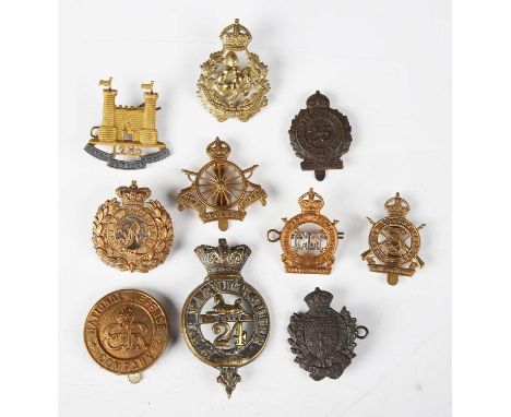 A small collection of British Army cap and other badges, including 2nd Warwickshire, Loyal Suffolk Hussars, Worcestershire Im