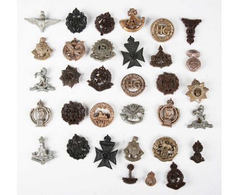 A good collection of Second World War period economy plastic cap and other badges, including Home Guard, Parachute Regiment, 