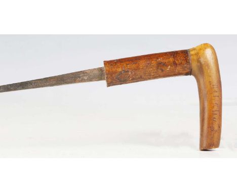 A late 19th century swordstick with square-section blade, blade length 54cm, stamped 'St Etienne', hazelwood shaft and applie