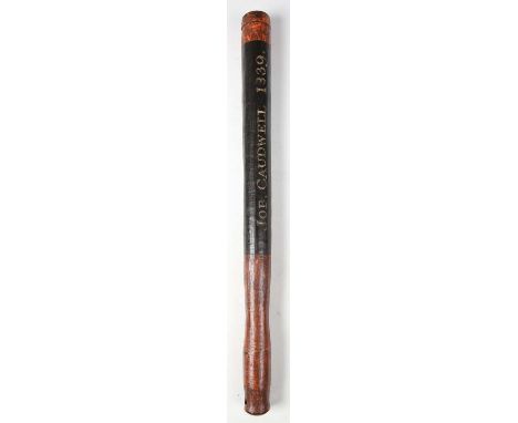 A rare early 19th century painted wooden police officer's truncheon, the black body detailed 'Job. Caudwell 1839' in white an