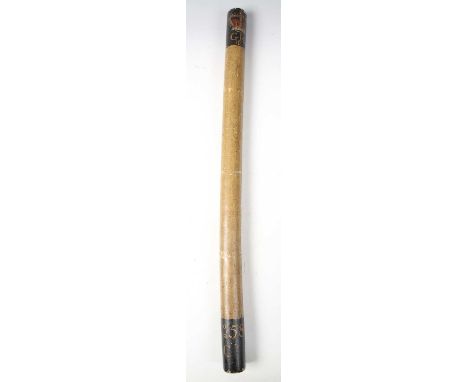 A scarce George III wooden police officer's truncheon or riot stick, the buff-painted shaft with black-banded end, polychrome