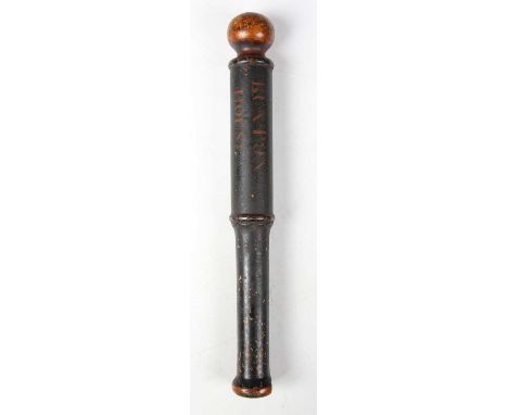 A scarce 19th century wooden police officer's truncheon, the black-painted body of turned baton form with unpainted knob end,