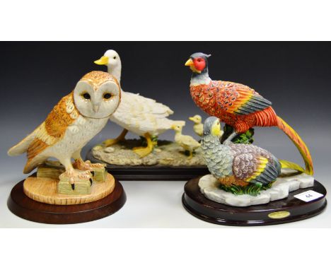 A Royal Doulton model of a Barn Owl; a Leonardo collection model of a Duck and Ducklings; etc (3)