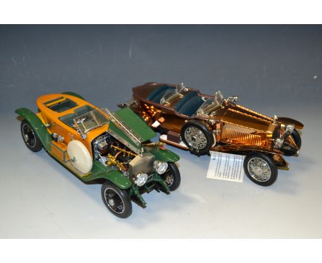 A Franklin Mint model of a 1921 Rolls Royce silver Ghost fitted with a copper body; another, with solid wood coachwork (2)