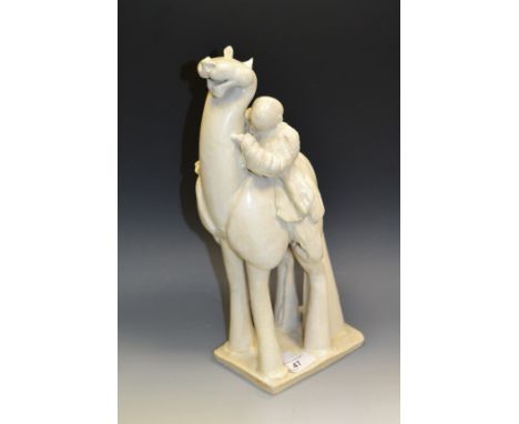 A Tang Dynasty style stoneware model, in the white, of a Horse and rider (1)