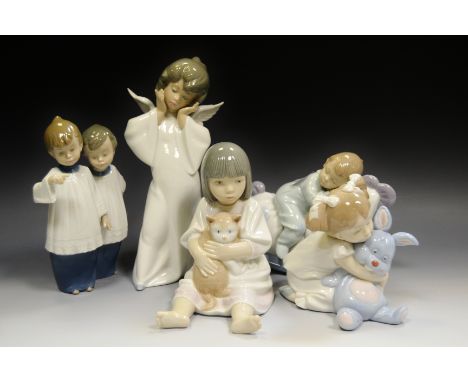 A Lladro figure of an Angel ; a Nao figure of a Girl with a Rabbit; others including a Girl with a Cat (5)