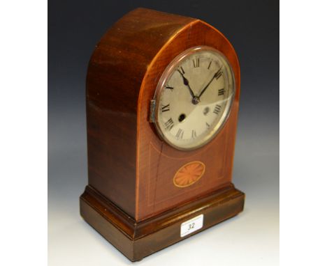 An Edwardian mahogany and marquetry lancet shaped mantel clock, inlaid with an oval shell patera, 8-day movement striking on 