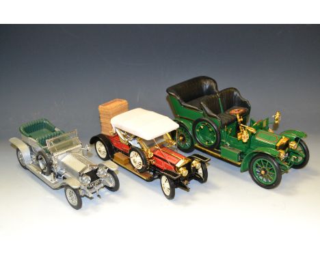A Franklin Mint Precision Model of a 1905 Rolls Royce 10HP; others, 1910 Balloon Roadster; The silver Ghost (3)
