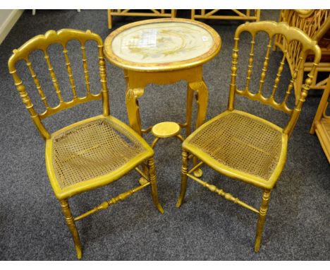 An early 20th century giltwood occasional table, glazed top enclosing a tapestry panel, c. 1900; a pair of gilt side chairs, 