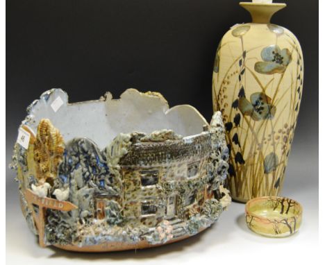Studio Pottery - a commissioned Petrina Booth earthenware bowl, profusely decorated in slip cast landscapes with a road sign 