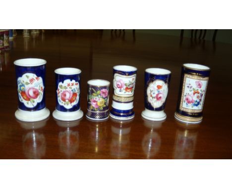 Six Royal blue ground floral spill vases, the smallest by Spode and decorated with pattern number 1166, 7.5cm high, the large