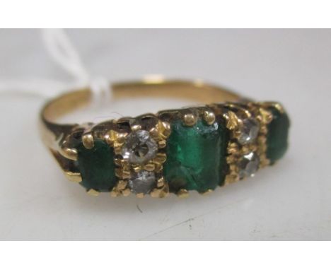 An 18ct gold emerald and diamond ring  