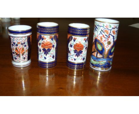 A pair and two other Derby Imari palette spill vases, the pair with pattern number 14, 10.5cm high, the tallest decorated wit