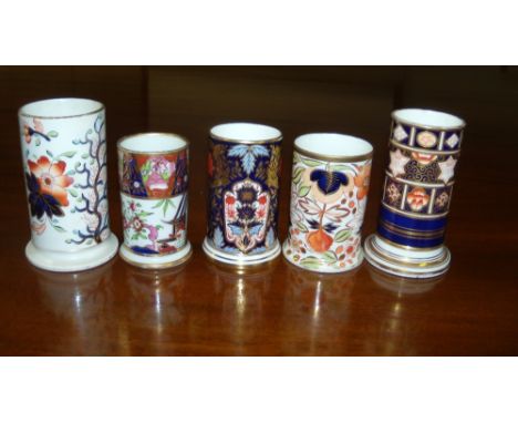 Five Imari palette spill vases, the tallest two,11cm high, that by Lynton, 9.5cm high, another probably Worcester 8.5cm high 