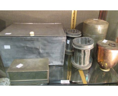 A Chinese cylindrical pewter caddy by Gee Wah, 20cm high, a rectangular soft pewter box, a/f, 30cm wide, two Victorian jelly 