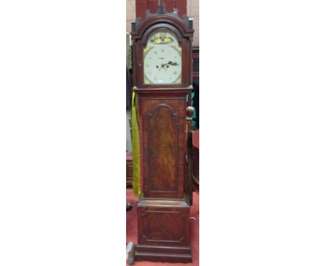 A George III mahogany longcase clock, 8 day striking movement to a painted arched dial with gothic towers and corner spandrel