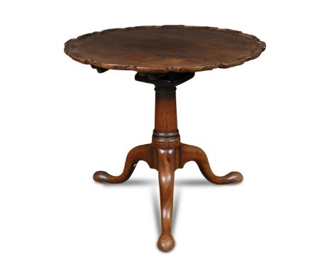 A George II mahogany tripod occasional table, piecrust tilt top, on birdcage and barrel turned column and three splayed legs,