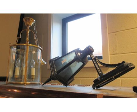 A modern brass framed hall lantern  