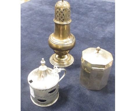 A George III silver mustard pot by Hester Bateman, 1786 a/f, an Edwardian sugar caster and an octagonal silver tea caddy, cir
