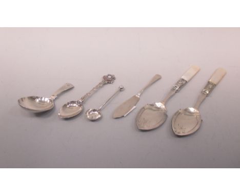 A fiddle pattern caddy spoon, London 1823, a butter knife, Birmingham 1920, a salt and a 'Brighton' tea spoon with two plate 